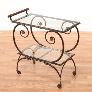 Appraisal: French Moderne wrought iron serving cart French Moderne wrought iron