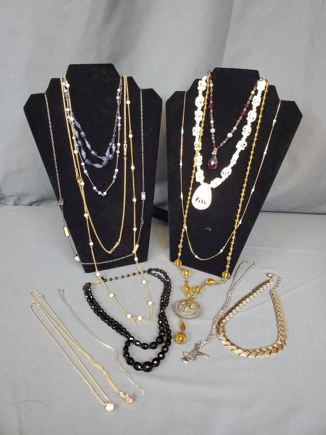 Appraisal: Costume jewelry grouping includes necklaces gold tone chain with round