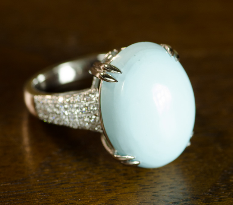 Appraisal: TURQUOISE DIAMOND AND FOURTEEN KARAT GOLD RING The white gold