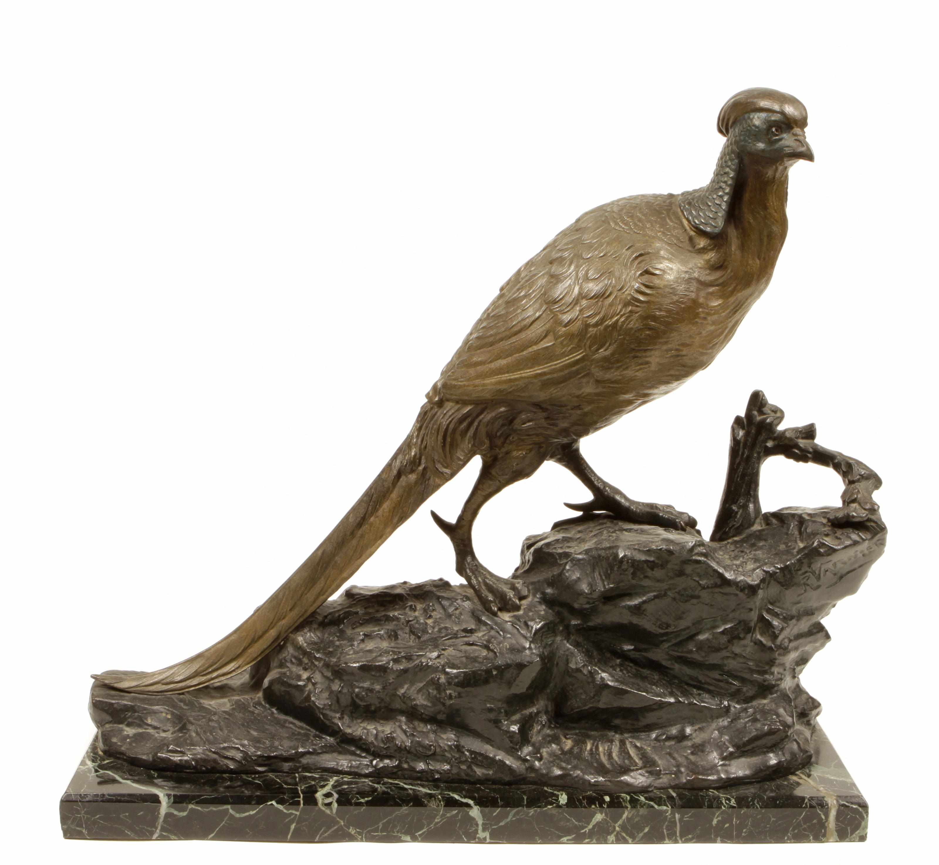 Appraisal: A patinated metal model of a pheasant atop a rocky