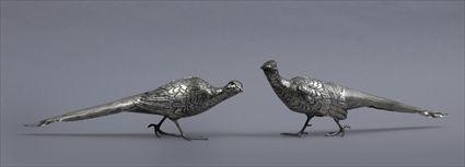 Appraisal: PAIR OF CONTINENTAL SILVER FIGURES OF PHEASANTS Unmarked each with