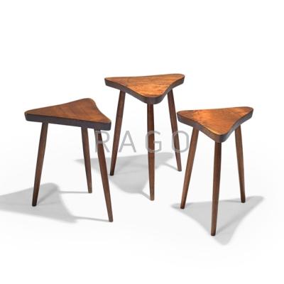 Appraisal: GEORGE NAKASHIMA NAKASHIMA STUDIOS Three amoeba three-legged walnut tables New