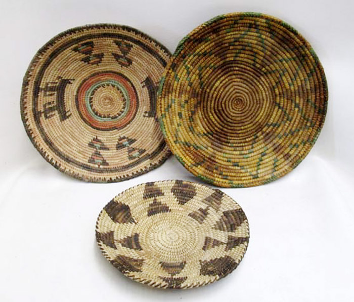 Appraisal: THREE NAVAJO WEDDING BASKETS two in traditional geometric woven designs