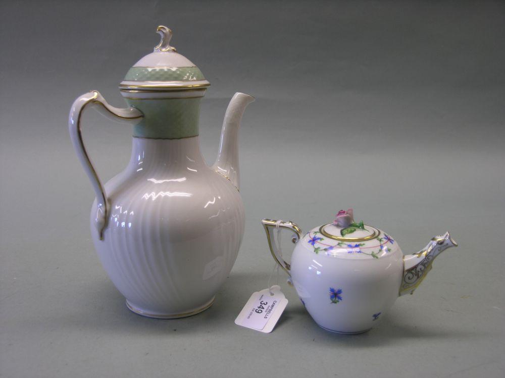 Appraisal: A Herend porcelain bachelor teapot with wishbone handle in and