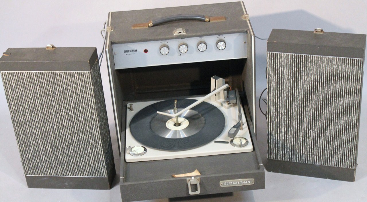 Appraisal: An Elizabethan model retro record player with articulated front revealing