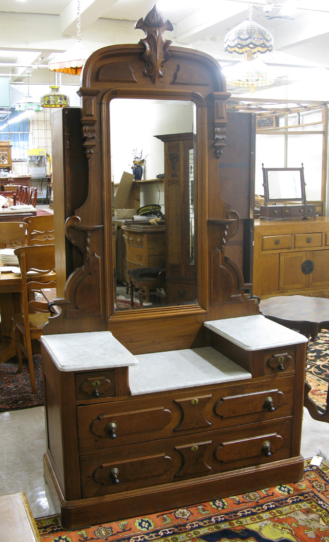 Appraisal: VICTORIAN WALNUT DRESSER Renaissance Revival American c having a tall