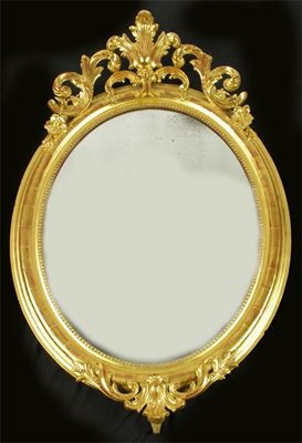 Appraisal: A French oval giltwood wall mirror with a foliage spray