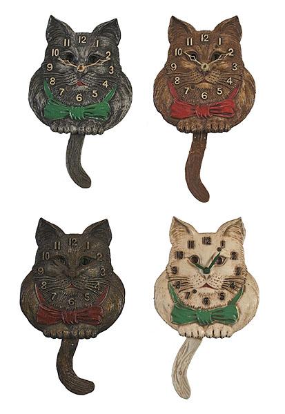 Appraisal: FOUR LUX CAT NOVELTY CLOCKS ca s- s -hour time