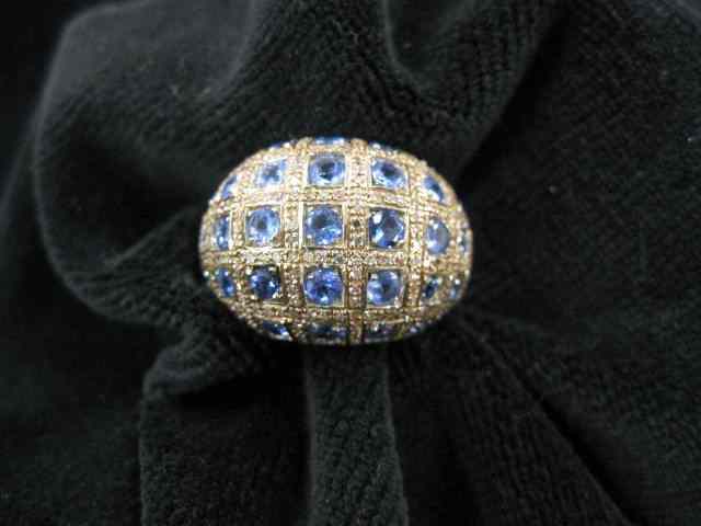 Appraisal: Tanzanite Ring high fashion dome with round tanzanite gems totaling