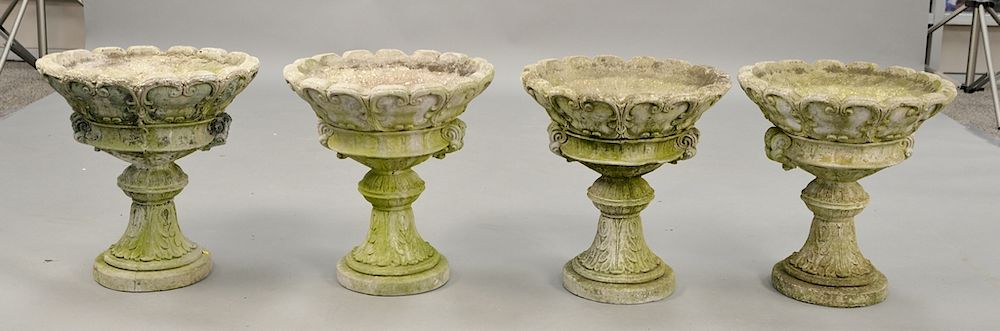 Appraisal: Set of four cement urns on pedestals ht in dia