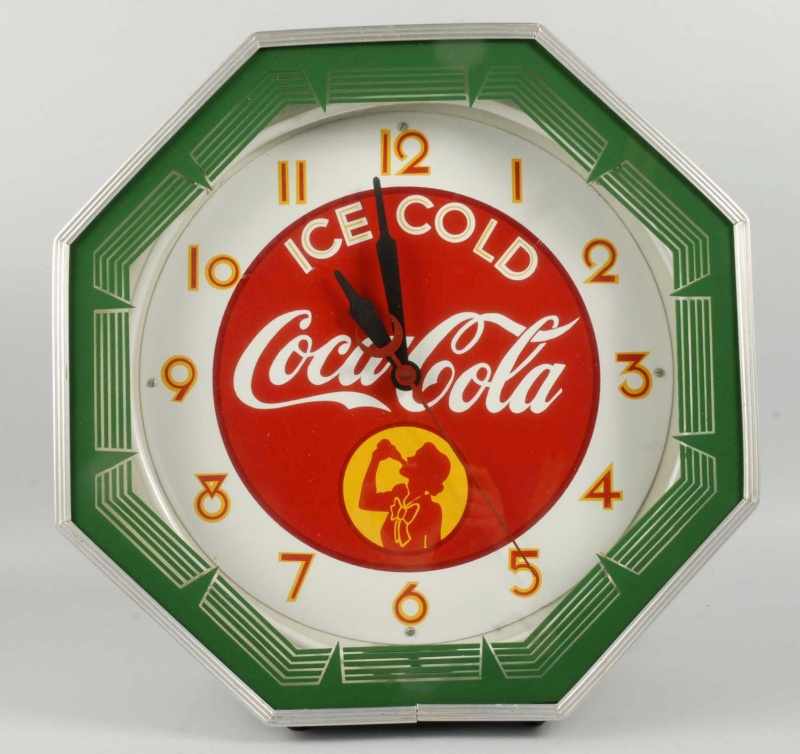 Appraisal: Neon Coca-Cola Advertising Clock Description Working Condition Excellent Size -