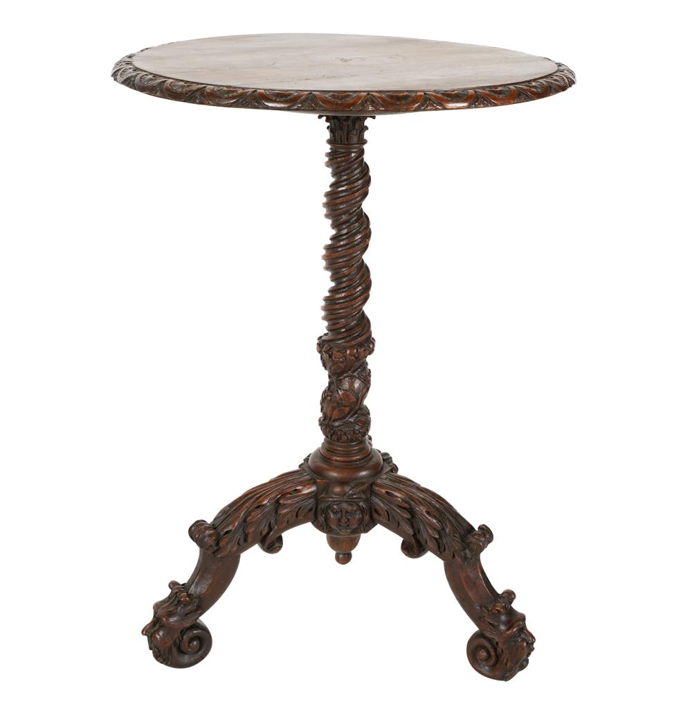 Appraisal: RENAISSANCE REVIVAL CARVED MAHOGANY TRIPOD TABLE th century inches diameter