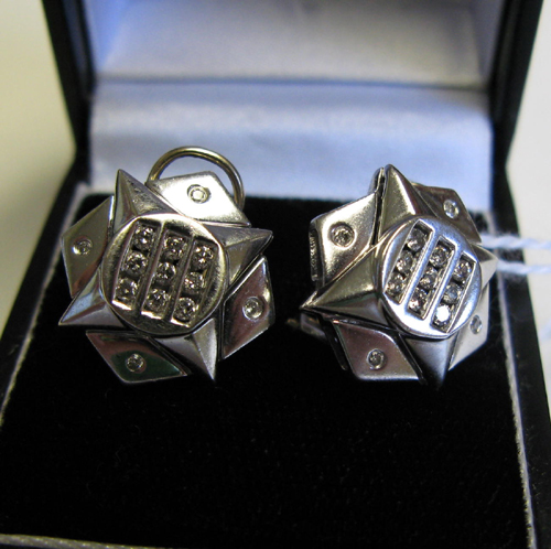 Appraisal: PAIR OF DIAMOND AND FOURTEEN KARAT WHITE GOLD EARRINGS each