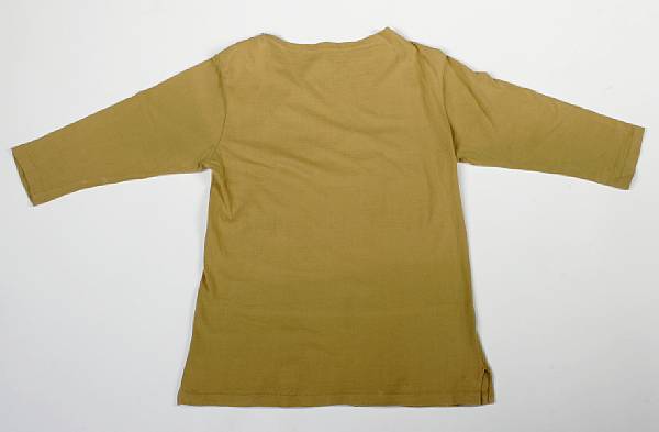 Appraisal: A Buddy Holly stage worn t-shirt Made of mustard-yellow cotton