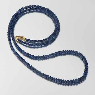 Appraisal: A Ladies' Sapphire Bead Necklace Faceted blue sapphire beads range