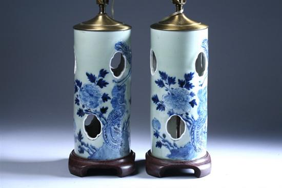 Appraisal: PAIR CHINESE CELADON PORCELAIN OPENWORK HAT STANDS With phoenix and