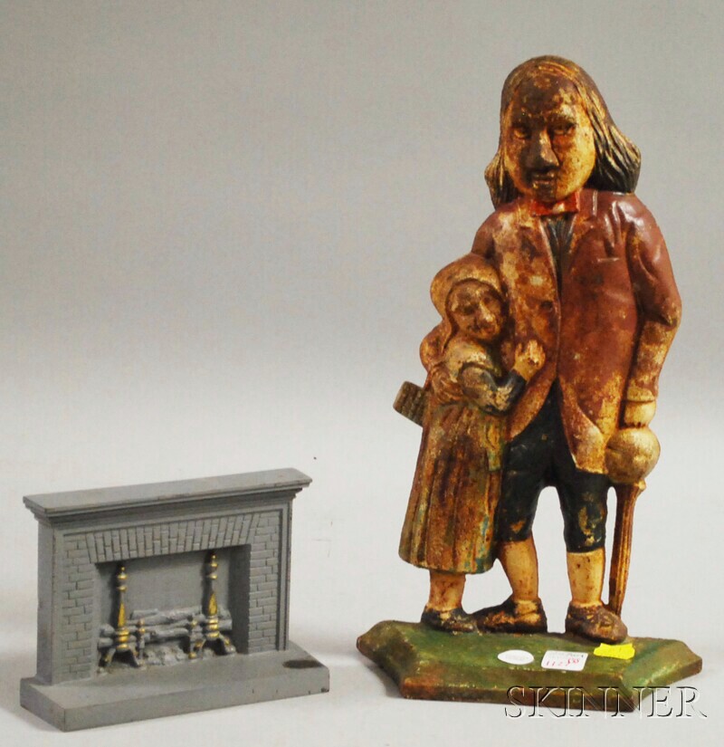 Appraisal: Painted Cast Iron Mr Peggotty and Little Agnes Doorstop and