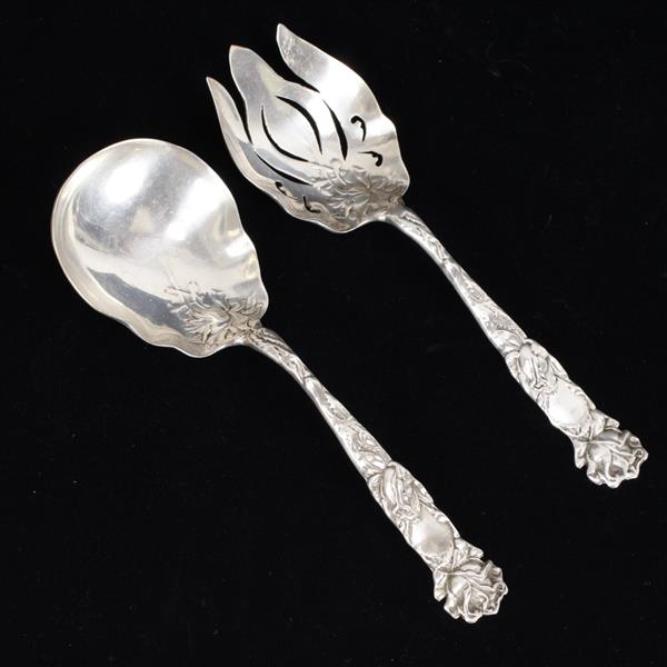 Appraisal: Sterling silver salad serving set with rose design to handles