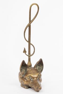 Appraisal: A brass door porter modelled as a fox mask with