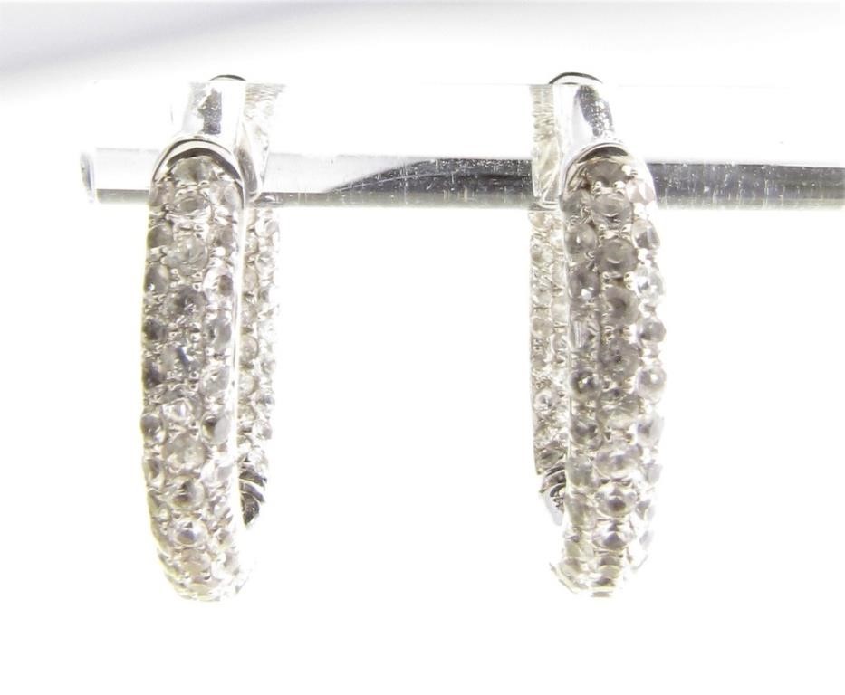 Appraisal: A pair of sterling silver hoop earrings in inside out