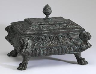 Appraisal: Bronze lidded box with lions' heads h Continental bronze lidded