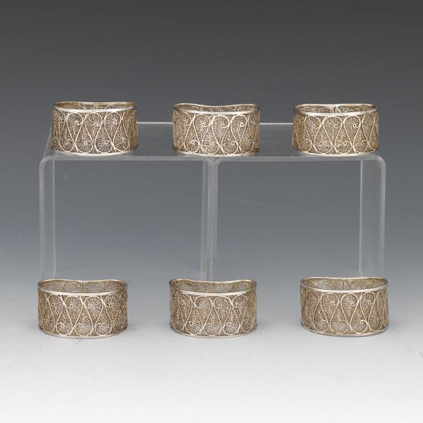 Appraisal: SIX STERLING SILVER FILIGREE NAPKIN RINGS x x Six kidney