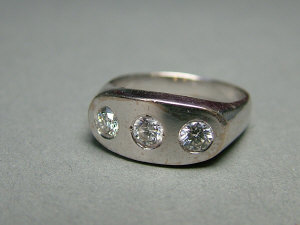 Appraisal: An ct white gold and three stone diamond ring With