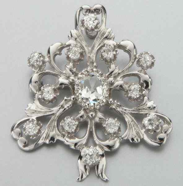 Appraisal: K gold and diamond pendant brooch conversionfeaturing a central old