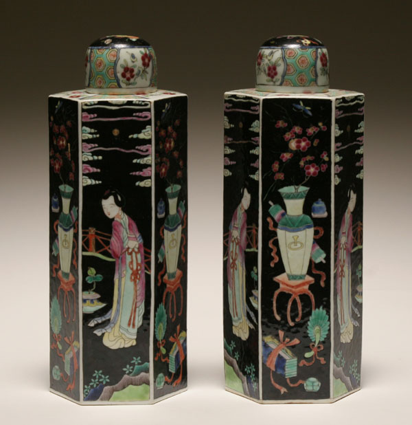 Appraisal: Pair Chinese porcelain hexagonal form lidded vases alternating outdoor scenes