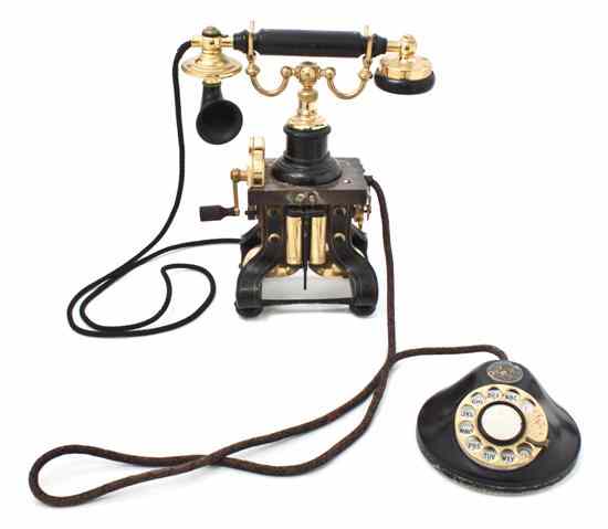 Appraisal: A Vintage Brass and Iron Telephone in two parts the