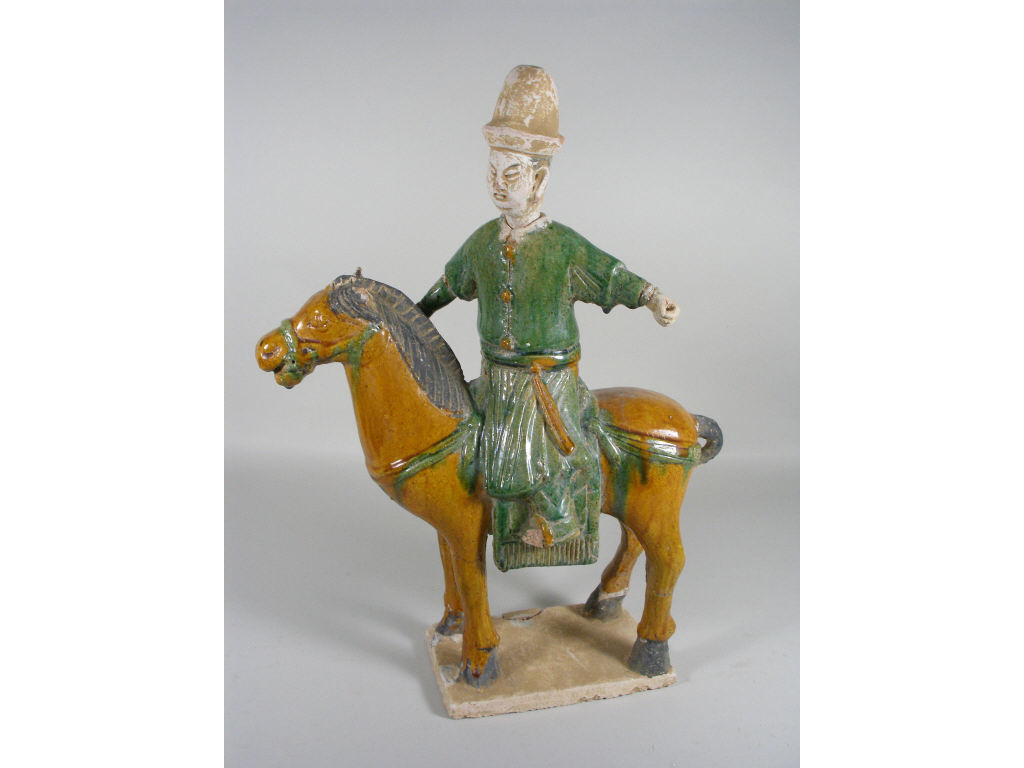 Appraisal: Chinese Ming Dynasty Equestrian Figure c - earthenware rider astride