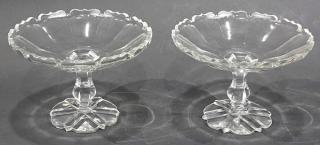 Appraisal: Pair of clear glass pedestal compotes Pair of clear glass