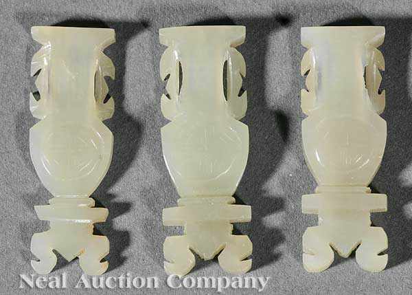 Appraisal: A Group of Chinese Celadon Jade Garment Appliqu s th