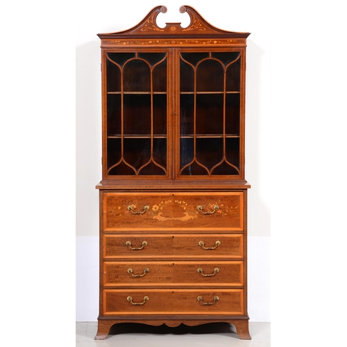 Appraisal: An Edwardian mahogany and inlaid secretaire bookcase crossbanded in satinwood