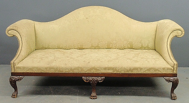 Appraisal: - Philadelphia Chippendale style mahogany camelback sofa with hairy paw