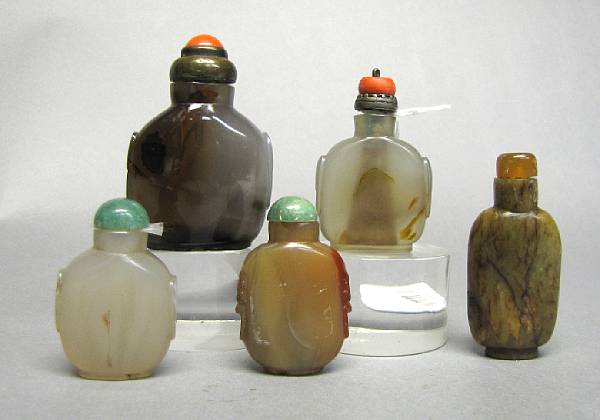 Appraisal: A group of five hardstone snuff bottles Including four of