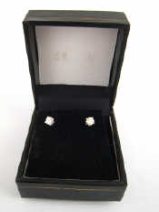 Appraisal: A pair of round brilliant cut diamond ear studs each