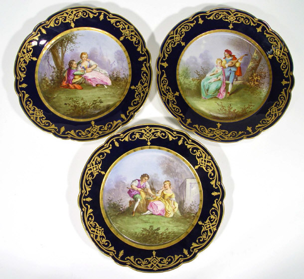 Appraisal: Three Sevres porcelain plates hand painted with scenes of lovers