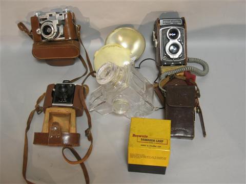 Appraisal: BOX OF OLD CAMERAS AND PARTS Together with Hasselbad camera