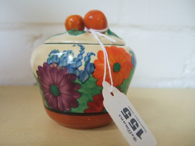 Appraisal: A Clarice Cliff Bizarre preserve pot and cover decorated in