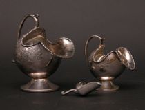 Appraisal: A Pair Of Nut Dishes Sheffield Charming Sheffield silver salt