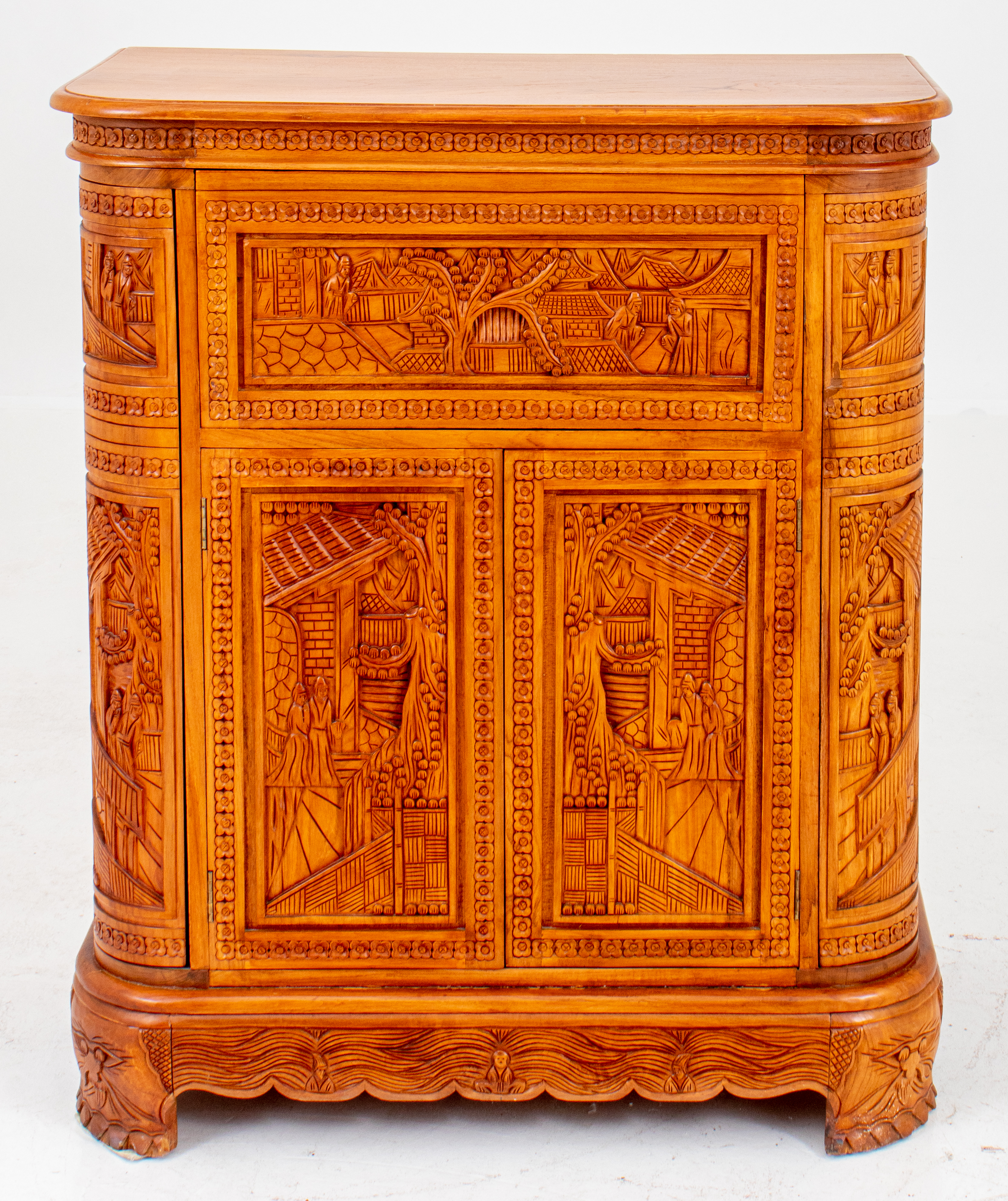 Appraisal: CHINESE CARVED AROMATIC WOOD COCKTAIL CABINET Chinese carved aromatic wood