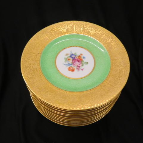 Appraisal: Hutschenreuther Porcelain Service Plates floral bouquet green trim gold encrusted