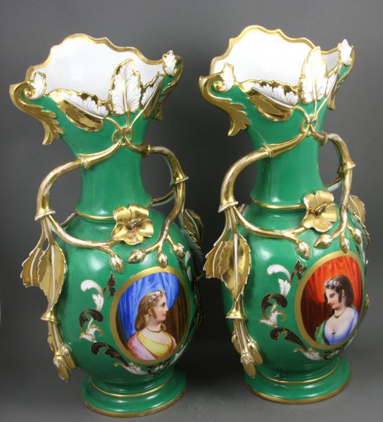 Appraisal: Pair of th Century Paris porcelain handpainted urns h Drill