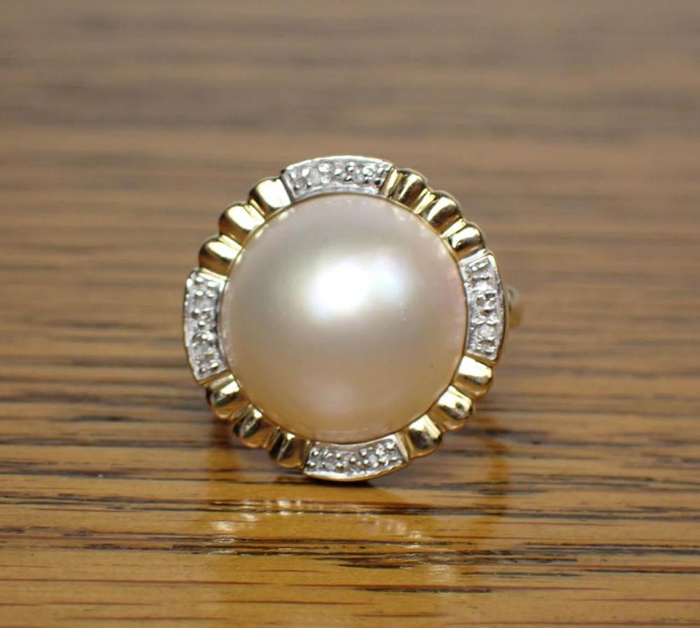 Appraisal: MABE PEARL DIAMOND AND FOURTEEN KARAT GOLD RING The k