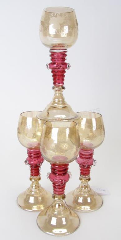 Appraisal: A set of four hand-blown Venetian goblets clear cranberry and