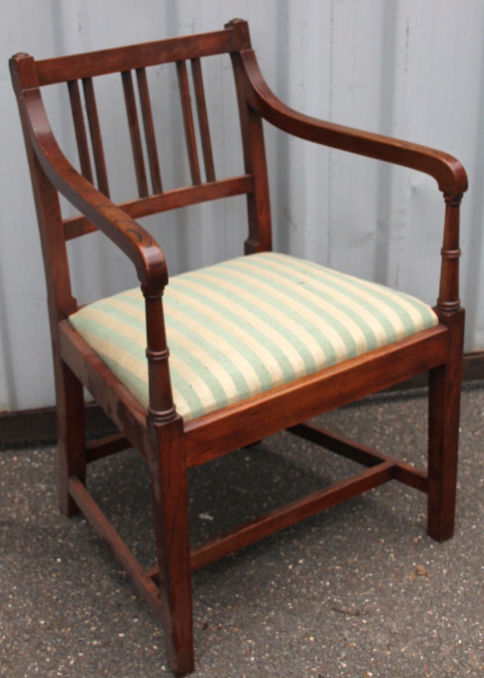 Appraisal: An thC elm Sheraton style country carver chair with a