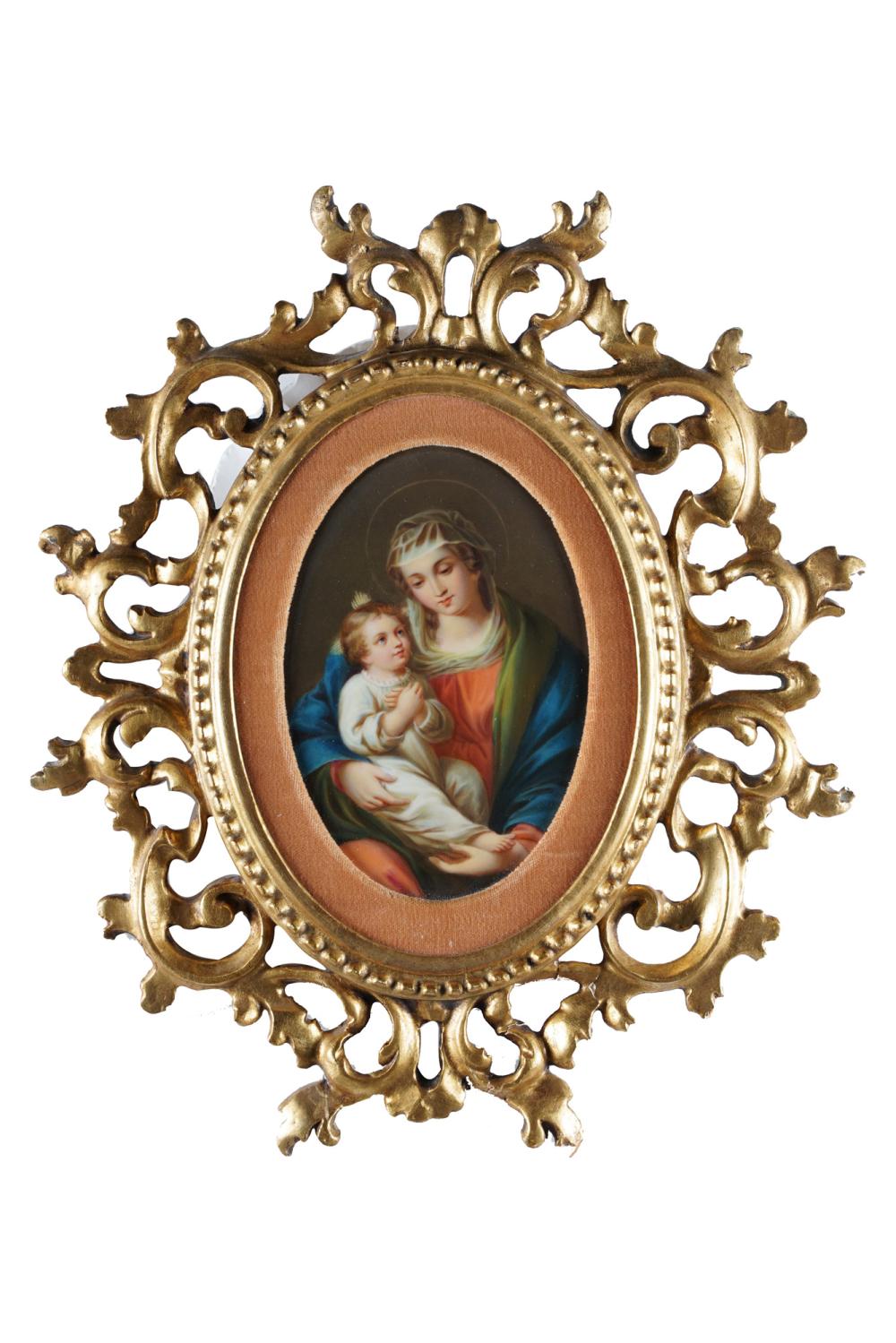 Appraisal: PLAQUE OF MADONNA CHILDporcelain apparently unsigned handpainted in a carved