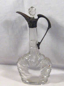 Appraisal: A German silver mounted cut glass claret jug circa cm