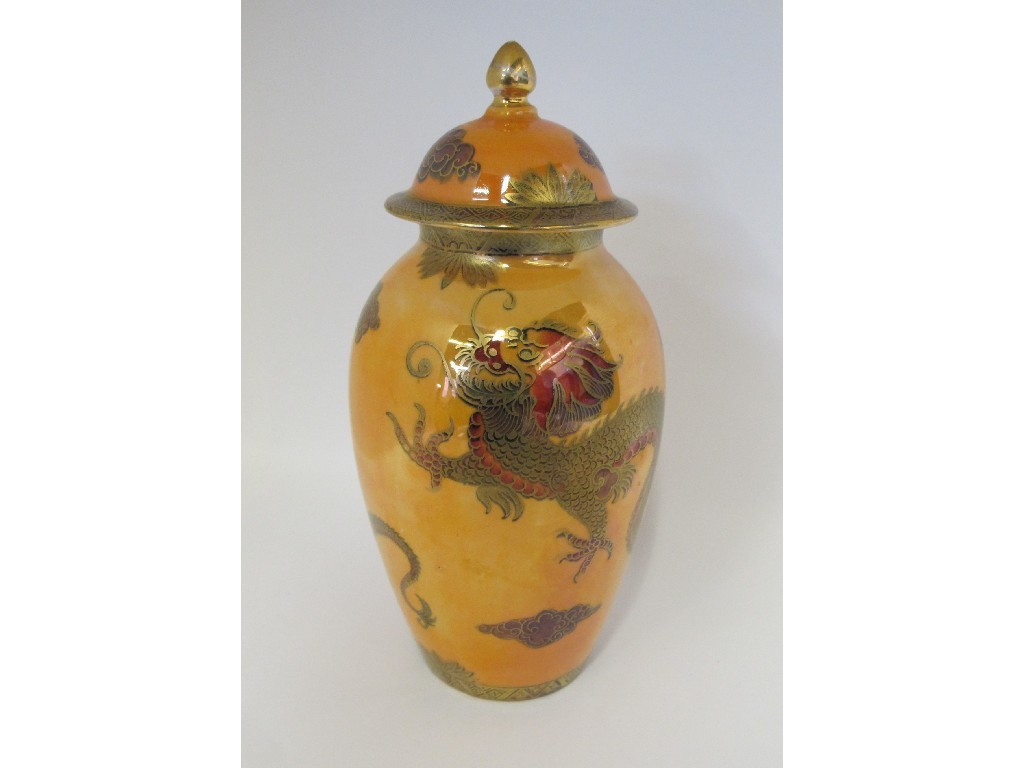 Appraisal: Maling lustre jar and cover painted with dragons on an